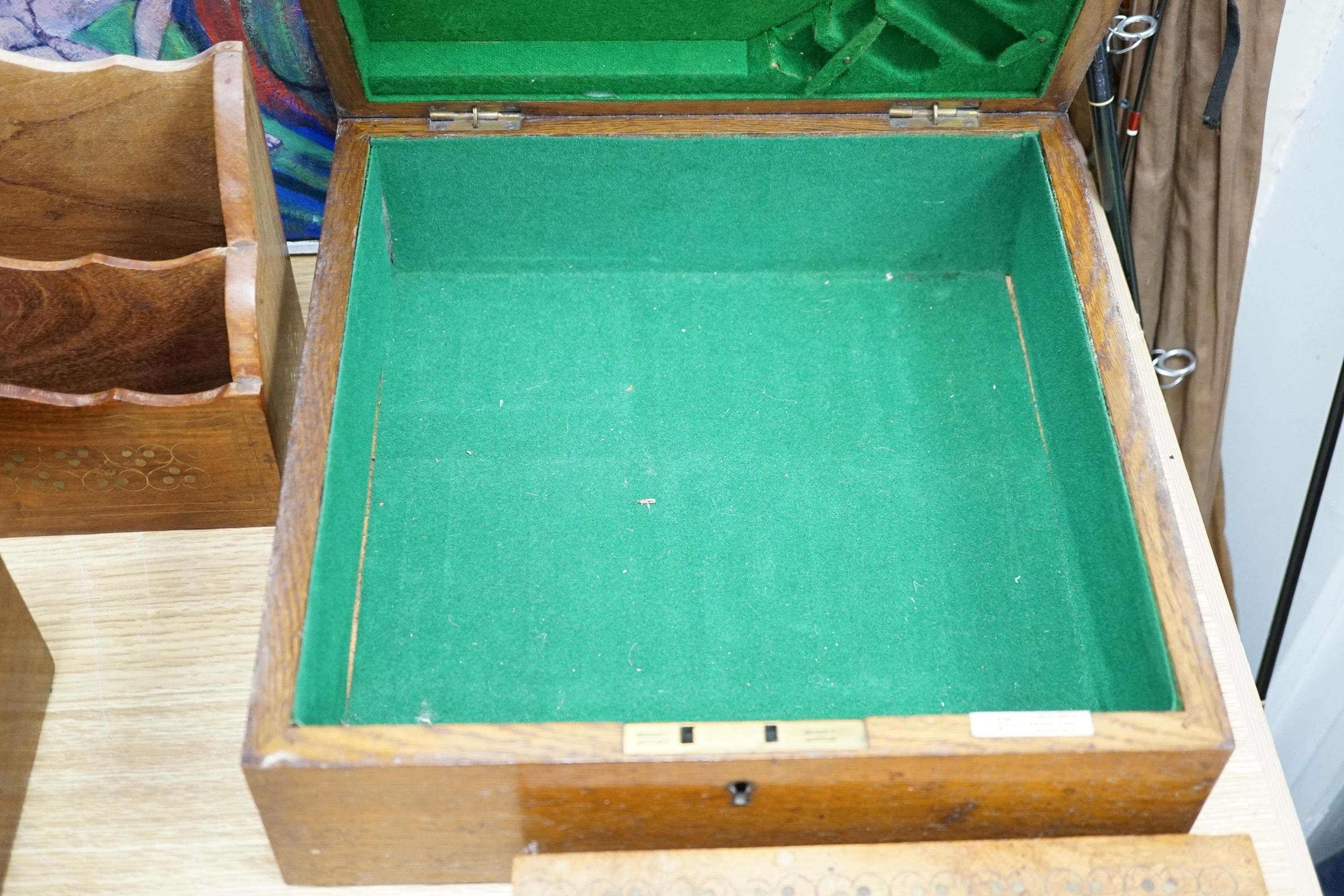 A Georgian square mahogany tea caddy, a brass inlaid hardwood stationary rack and box, and sundry items